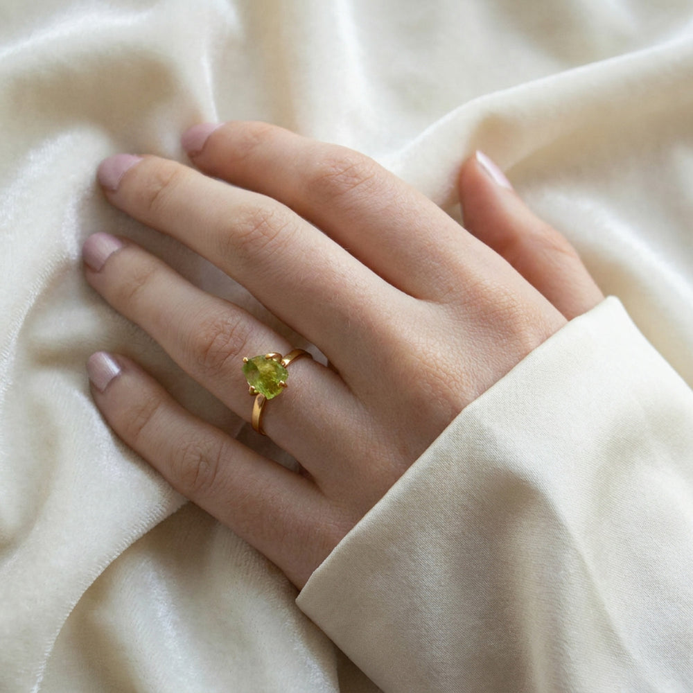 Raw peridot ring worn on hand — gold vermeil with uncut Arizona peridot centre stone