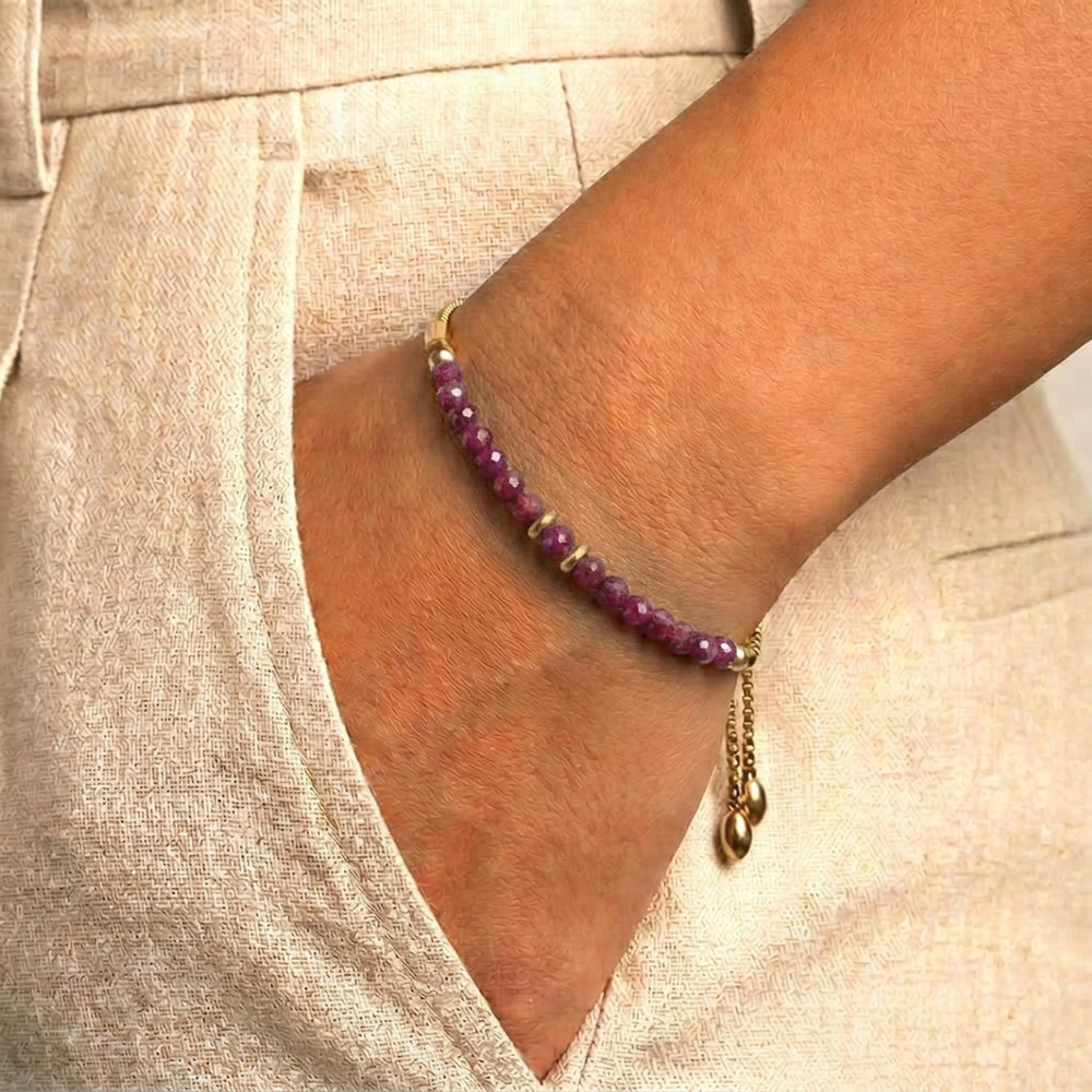 Model wearing Abiza July birthstone ruby bracelet on wrist