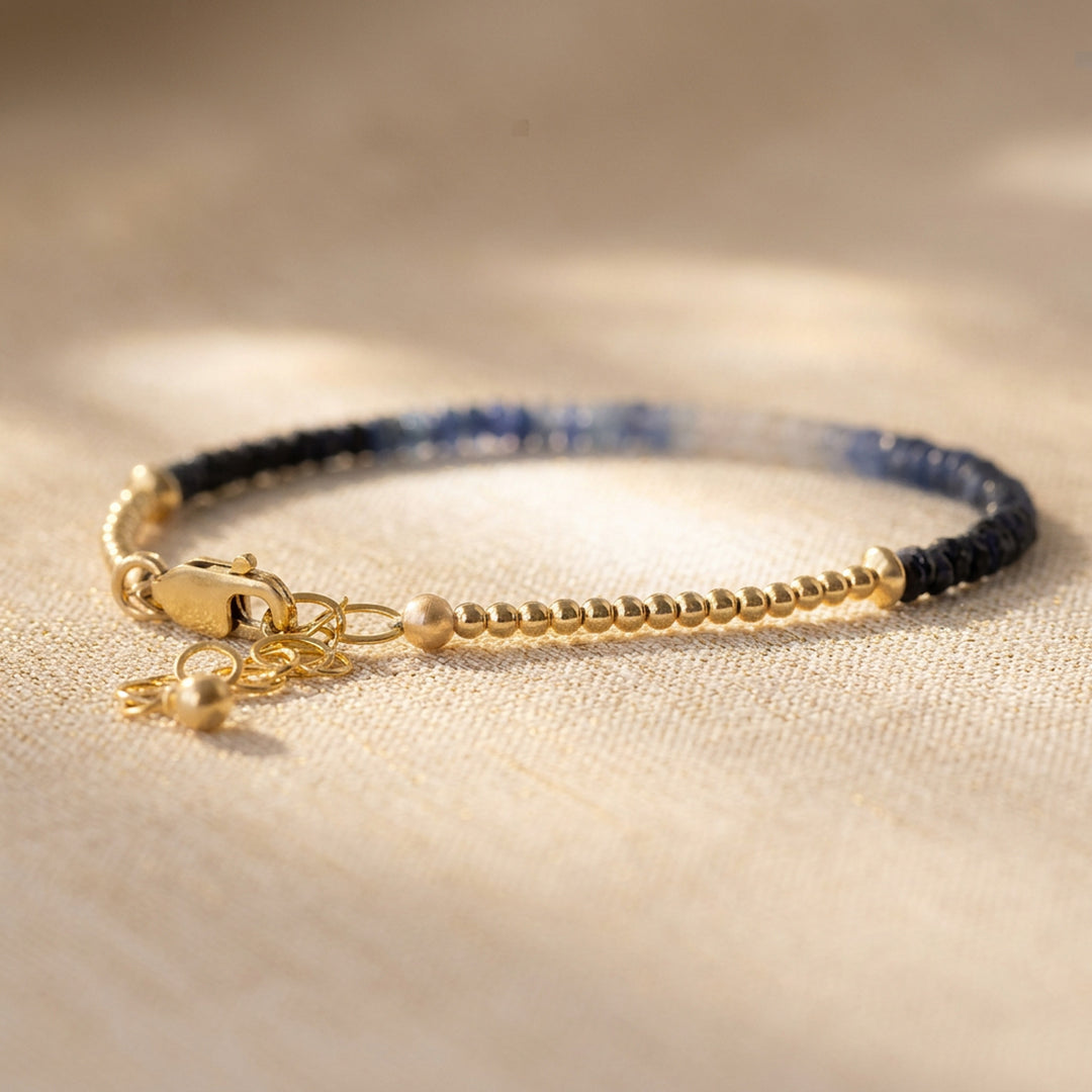 Clasp and extender detail — 2mm metal beads strung to lobster clasp with extender chain