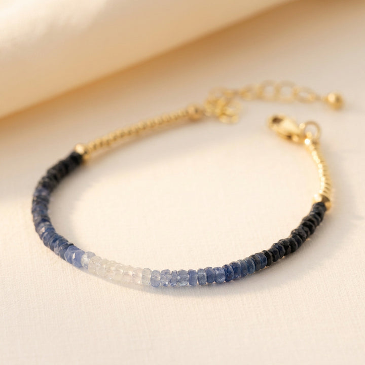 Ombré sapphire Fine bracelet flat lay showing the hand strung ombré detail