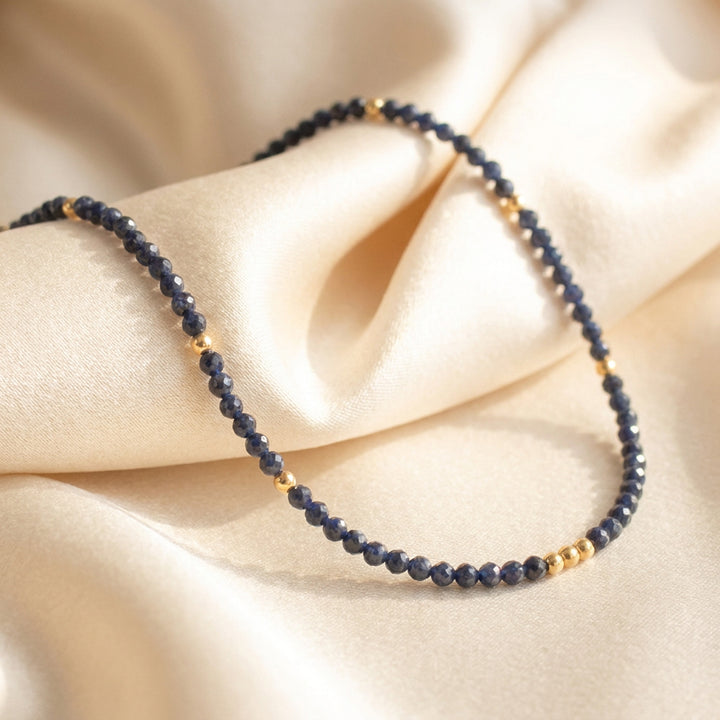 14K gold filled sapphire necklace close-up — 2.5mm diamond-cut natural untreated deep blue beads