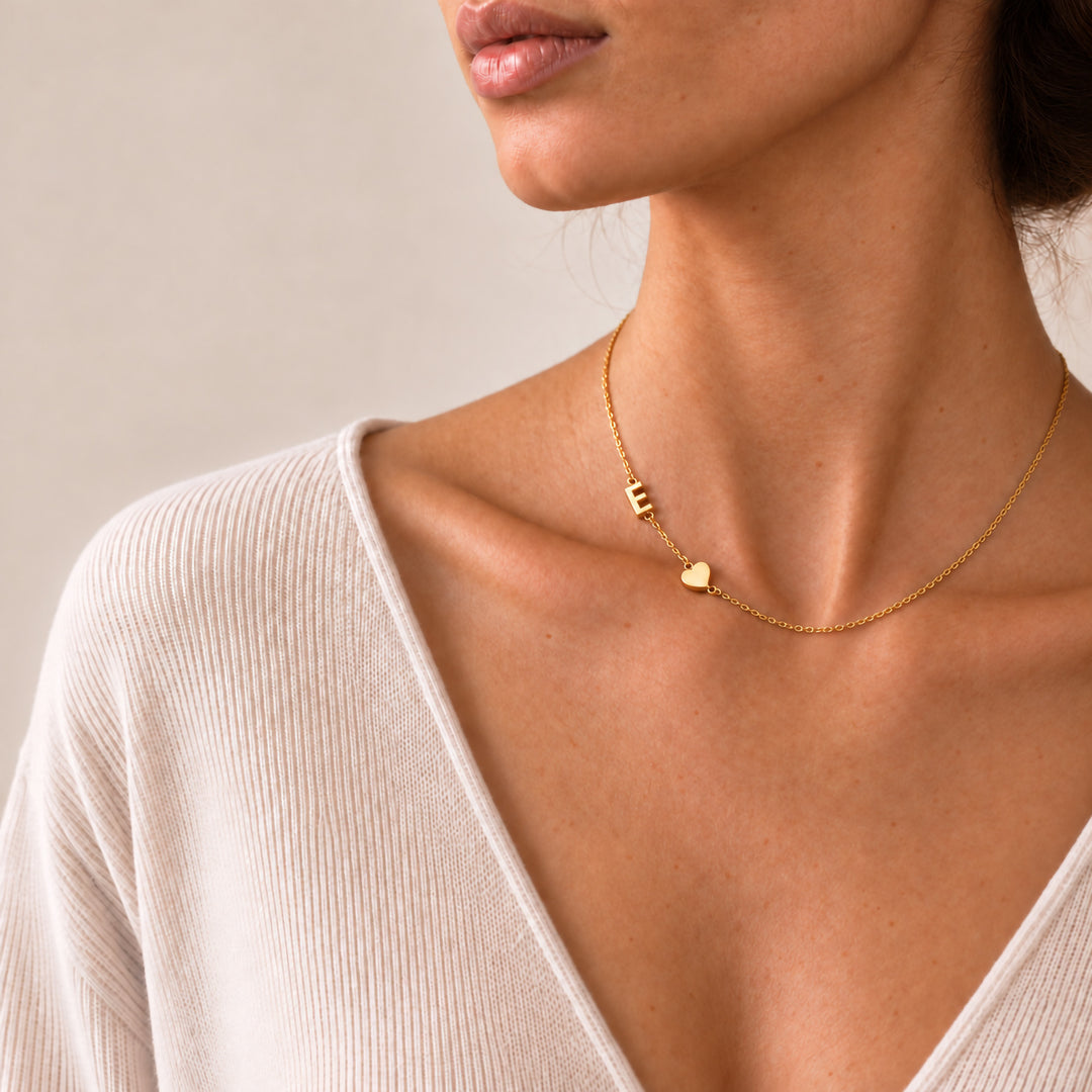 Sideways initial necklace in 18K gold — multi-letter pendant design