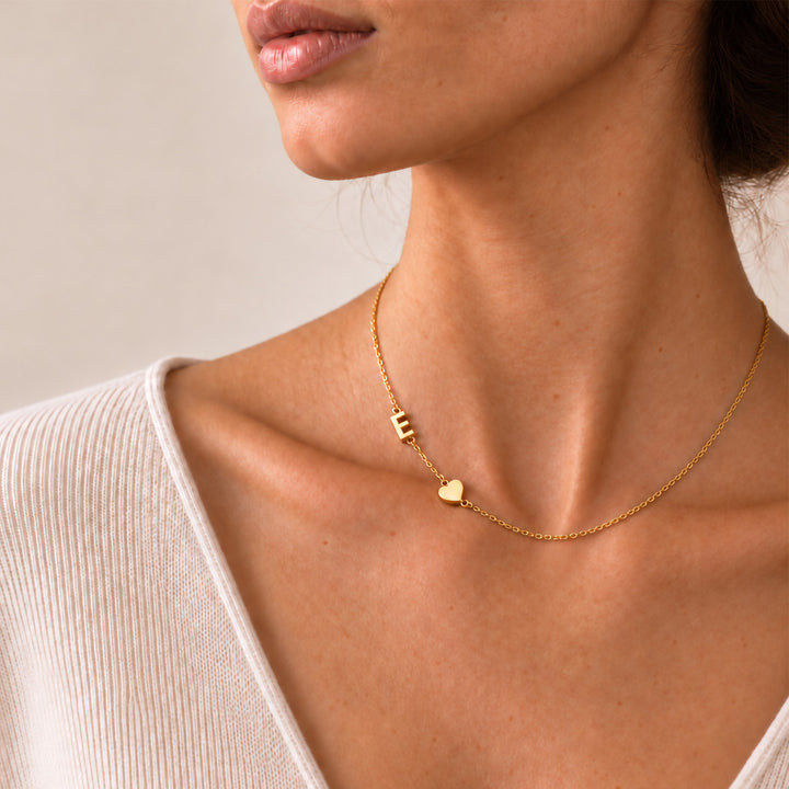 Sideways initial necklace in 18K gold — l heart and etter pendant design