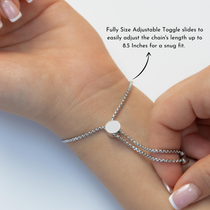 Silver photo bracelet on a wrist with text explaining adjustable feature