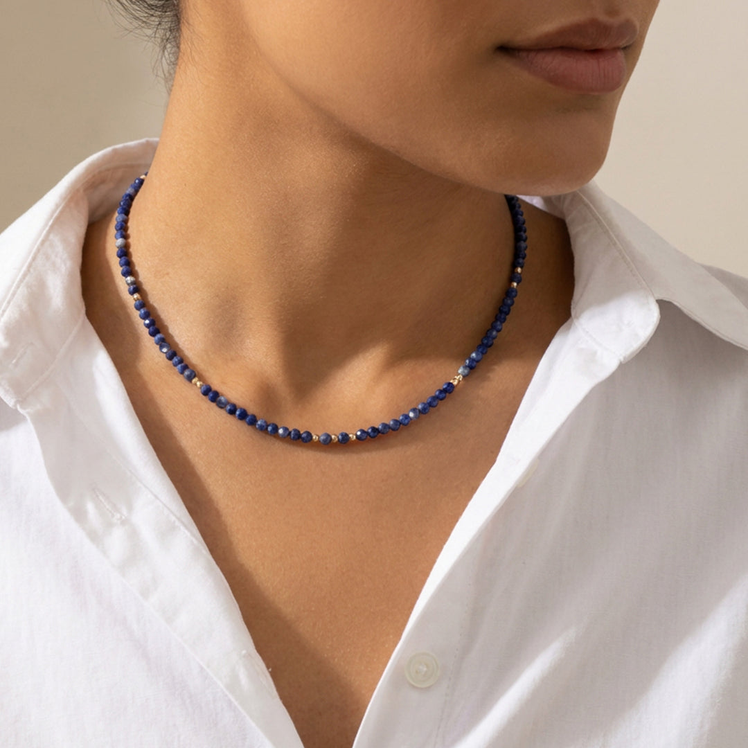 Real sodalite necklace on model — hand-strung in our Chester studio, deep blue Stone of Intuition