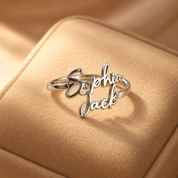 Silver personalised name ring with two names, Sophia and Jack, flat lay