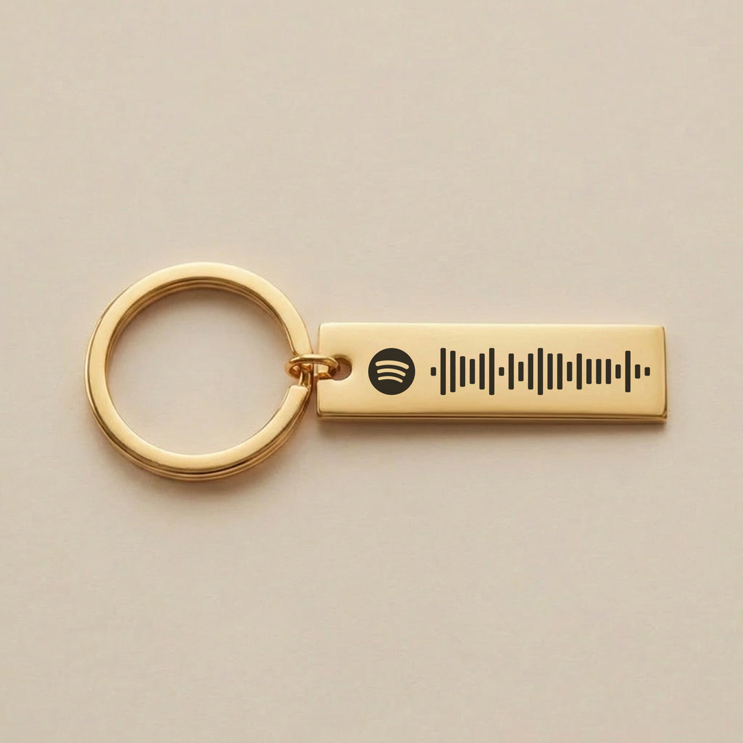 gold personalised Spotify keyring with custom engraved song code bar
