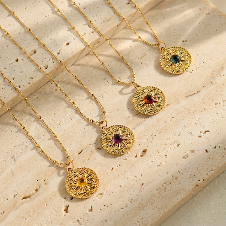 Abiza Gemstone Sun Necklaces collection — gold pendants with real gemstone centres
