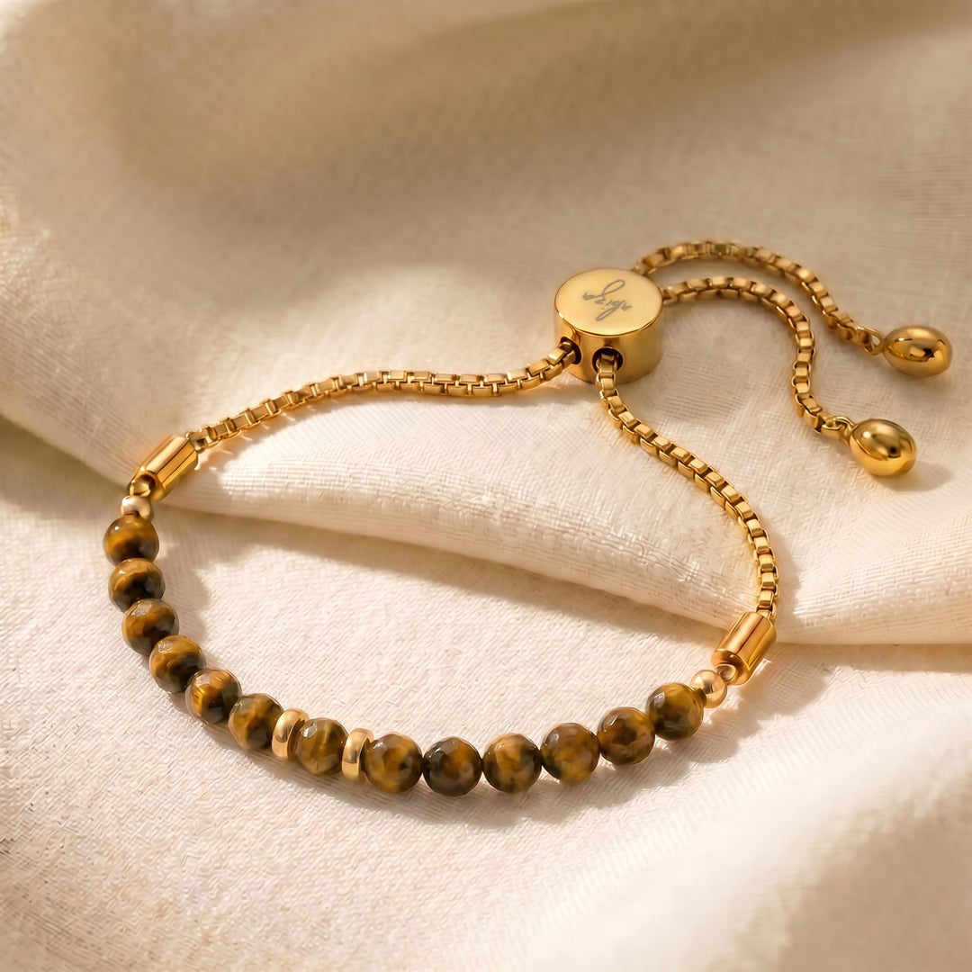 Gold tiger eye bracelet with 4mm genuine golden-brown tiger eye beads on adjustable slider chain
