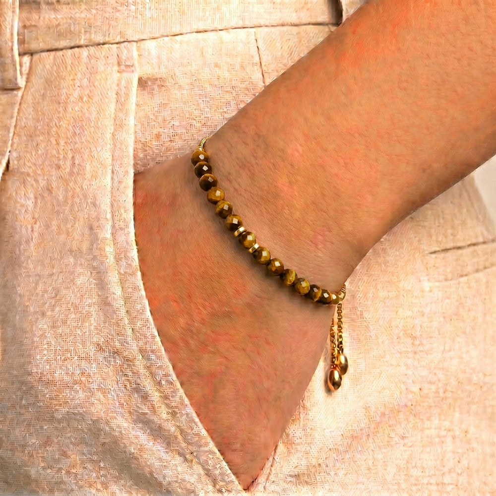 Model wearing Abiza tiger eye bracelet on wrist