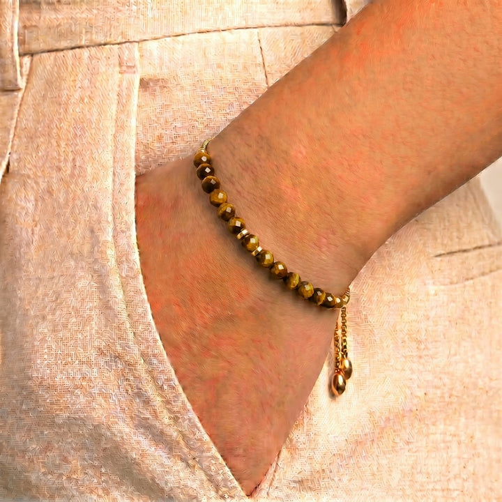 Model wearing Abiza tiger eye bracelet on wrist