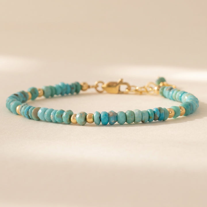 Real Arizona turquoise bracelet — close-up showing the rustic 4mm hand-cut faceted rondelle beads with natural matrix inclusions