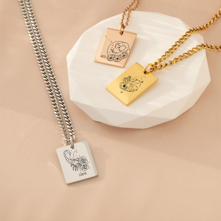 Engraved zodiac sign necklaces in gold, silver and rose gold