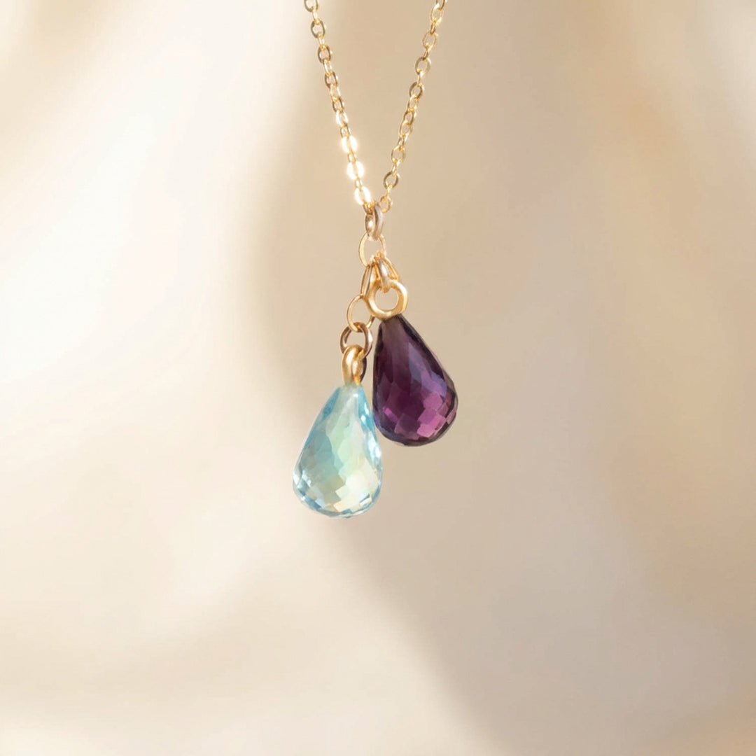 Two-stone family birthstone necklace, dainty teardrop crystals close-up