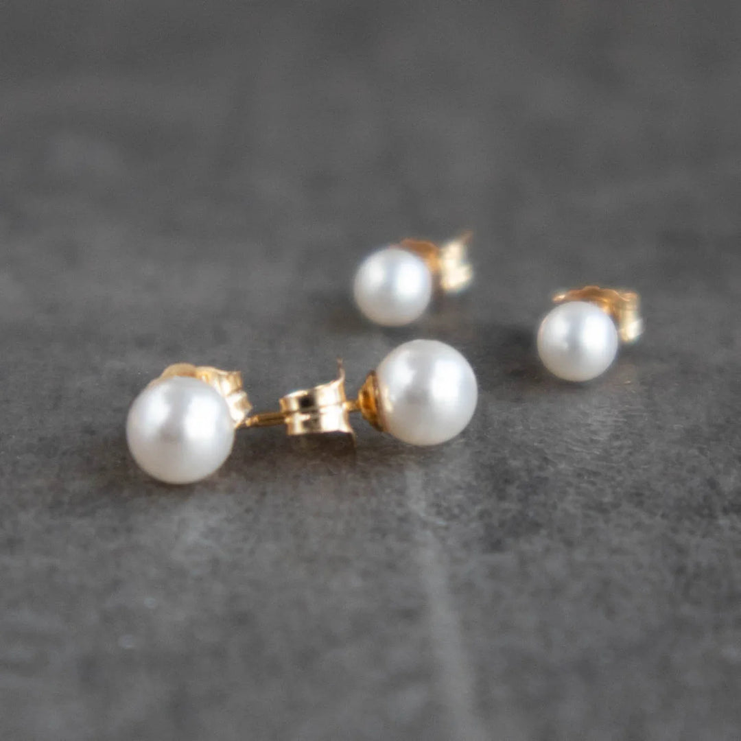 Gold pearl stud earrings